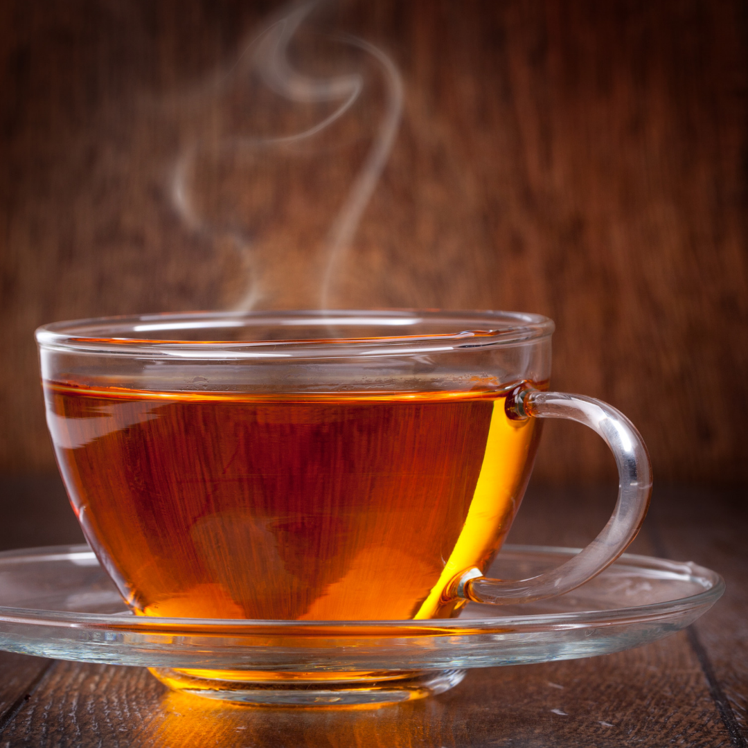 A cup of tea with steam rising out of it